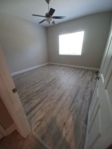 en empty room with windows