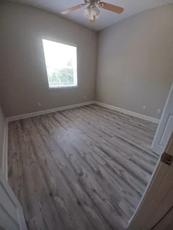an empty room with windows