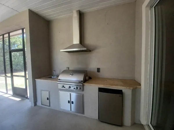a kitchen with a stove and a microwave