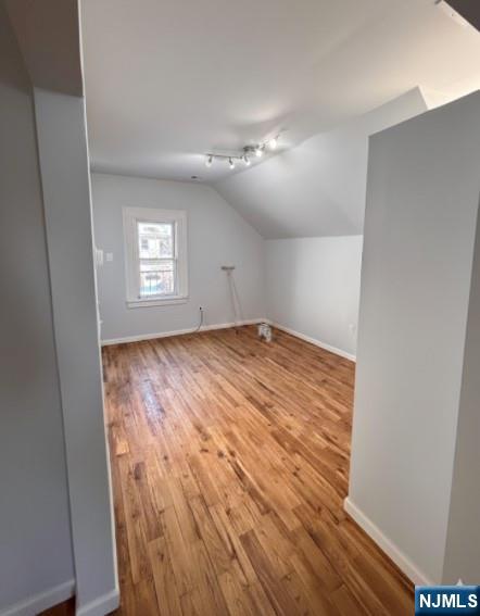 332 70th Street, Unit 2 Guttenberg, NJ 07093 - Photo 3 of 7 a view of empty room with windows