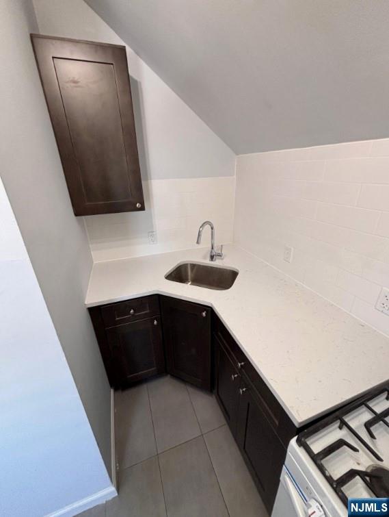 332 70th Street, Unit 2 Guttenberg, NJ 07093 - Photo 7 of 7 a kitchen with a sink and a mirror