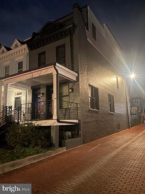 a view of a house with a porch