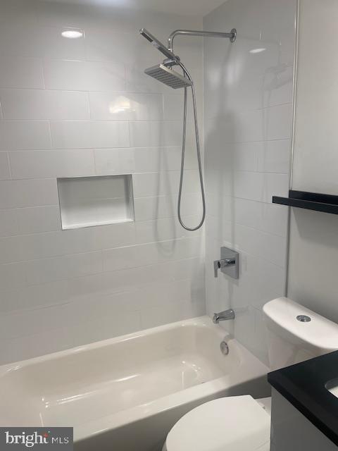 724 Taylor Street Northwest, Unit 1 Washington, DC 20011 - Photo 17 of 36 a bathroom with a sink a toilet and a shower