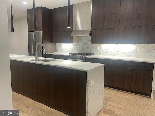 724 Taylor Street Northwest, Unit 1 Washington, DC 20011 - Photo 34 of 36 a kitchen with a sink cabinets and a window