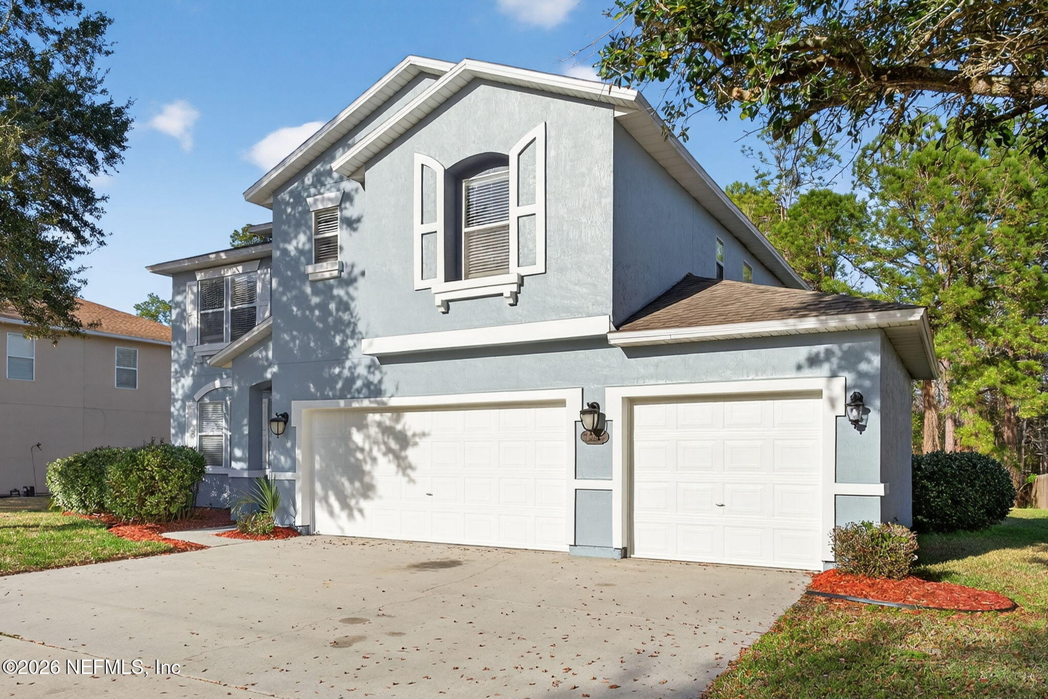 76134 Tideview Lane Yulee, FL 32097 - Photo 1 of 44 a view of a house with a outdoor space