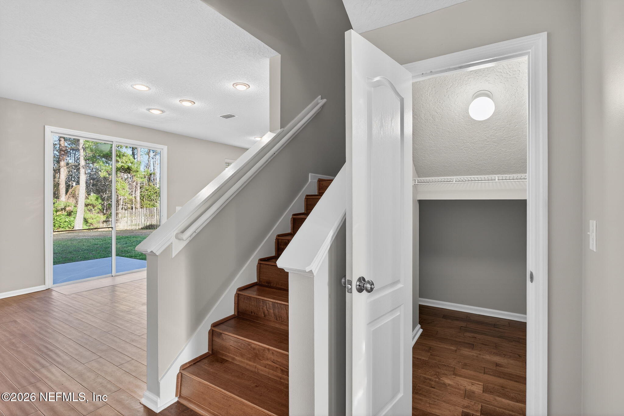 76134 Tideview Lane Yulee, FL 32097 - Photo 21 of 44 a view of entryway with wooden floor and door