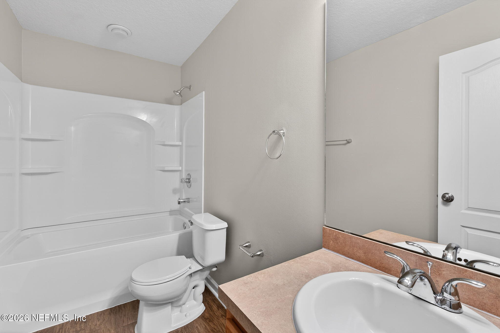 76134 Tideview Lane Yulee, FL 32097 - Photo 32 of 44 a bathroom with a sink toilet and shower