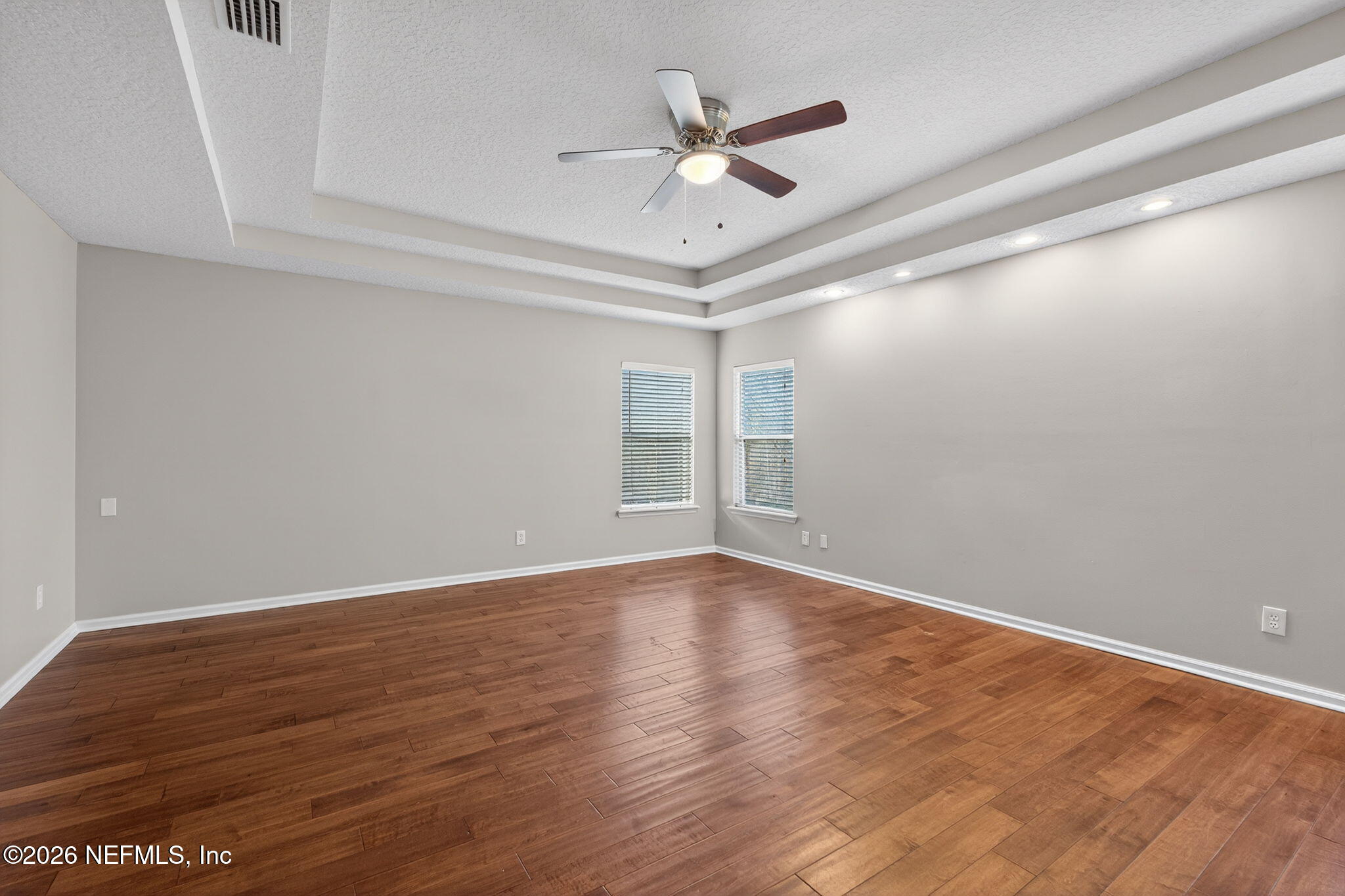 76134 Tideview Lane Yulee, FL 32097 - Photo 34 of 44 wooden floor in an empty room