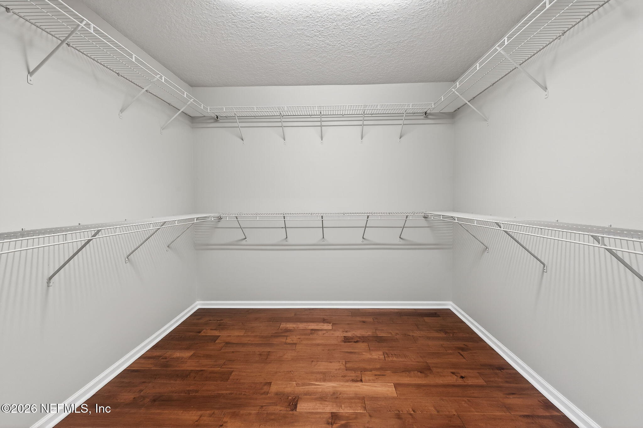 76134 Tideview Lane Yulee, FL 32097 - Photo 40 of 44 a view of a room with racks on the wall