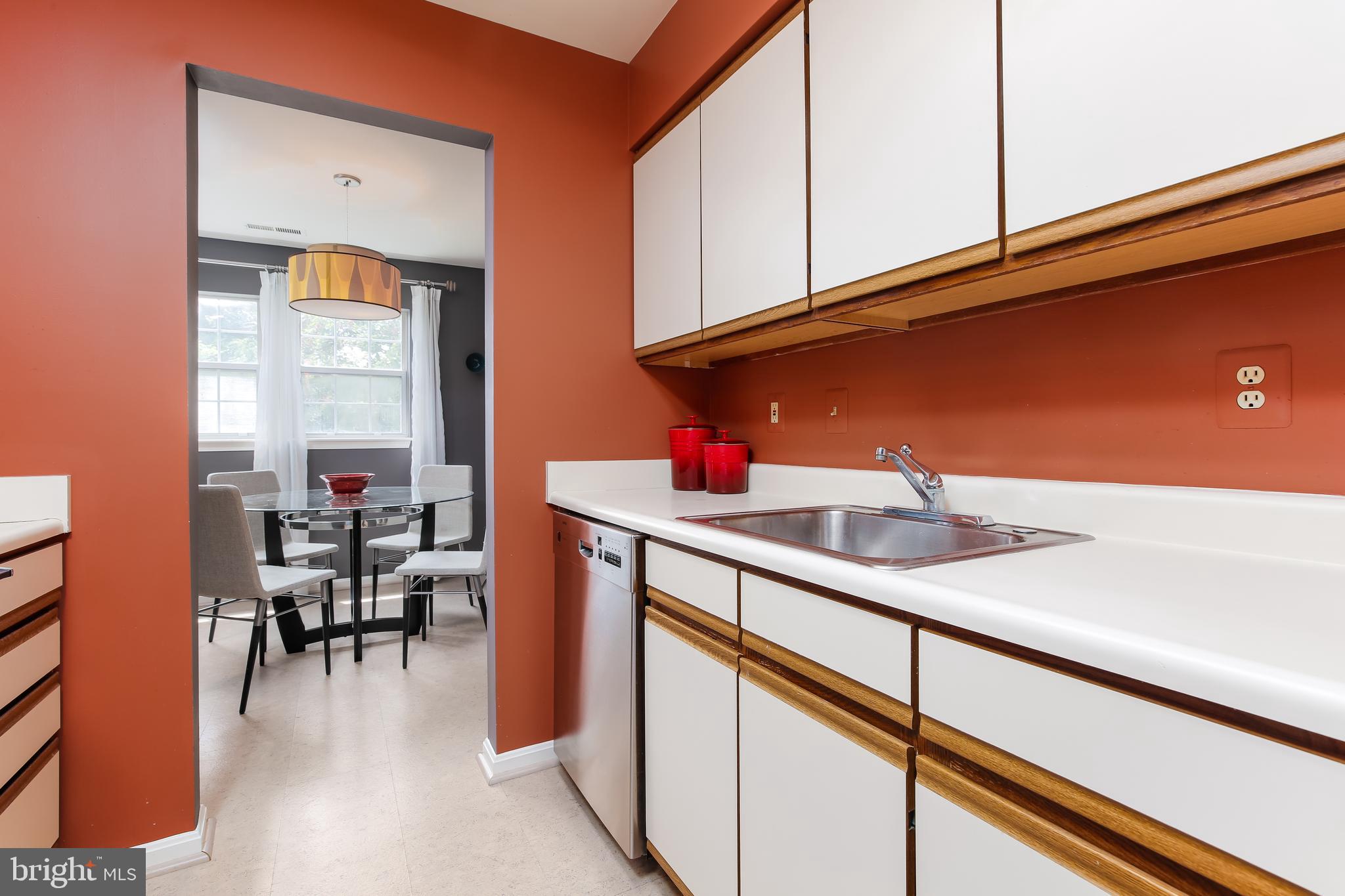 8585 Falls Run Road, Unit J Ellicott City, MD 21043 - Photo 6 of 17 Kitchen leads to breakfast area