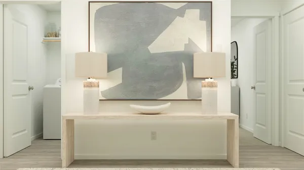 a kitchen with cabinets stainless steel appliances and a window