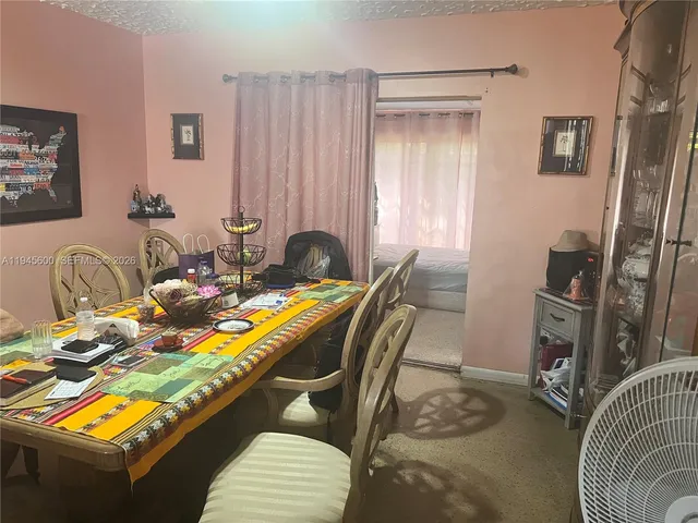 a view of a workspace with furniture