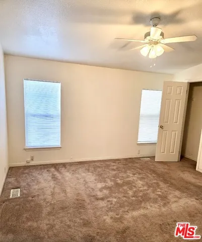a bathroom with a sink a vanity and a mirror