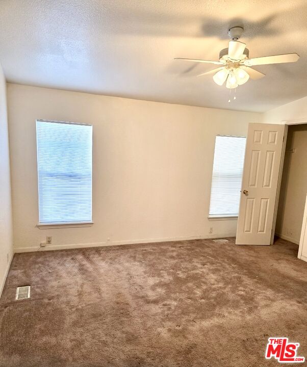 17700 South Avalon Boulevard, Unit 422 Carson, CA 90746 - Photo 14 of 17 a view of an empty room and window