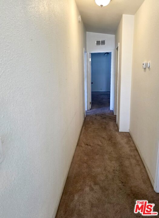 17700 South Avalon Boulevard, Unit 422 Carson, CA 90746 - Photo 7 of 17 a view of a hallway