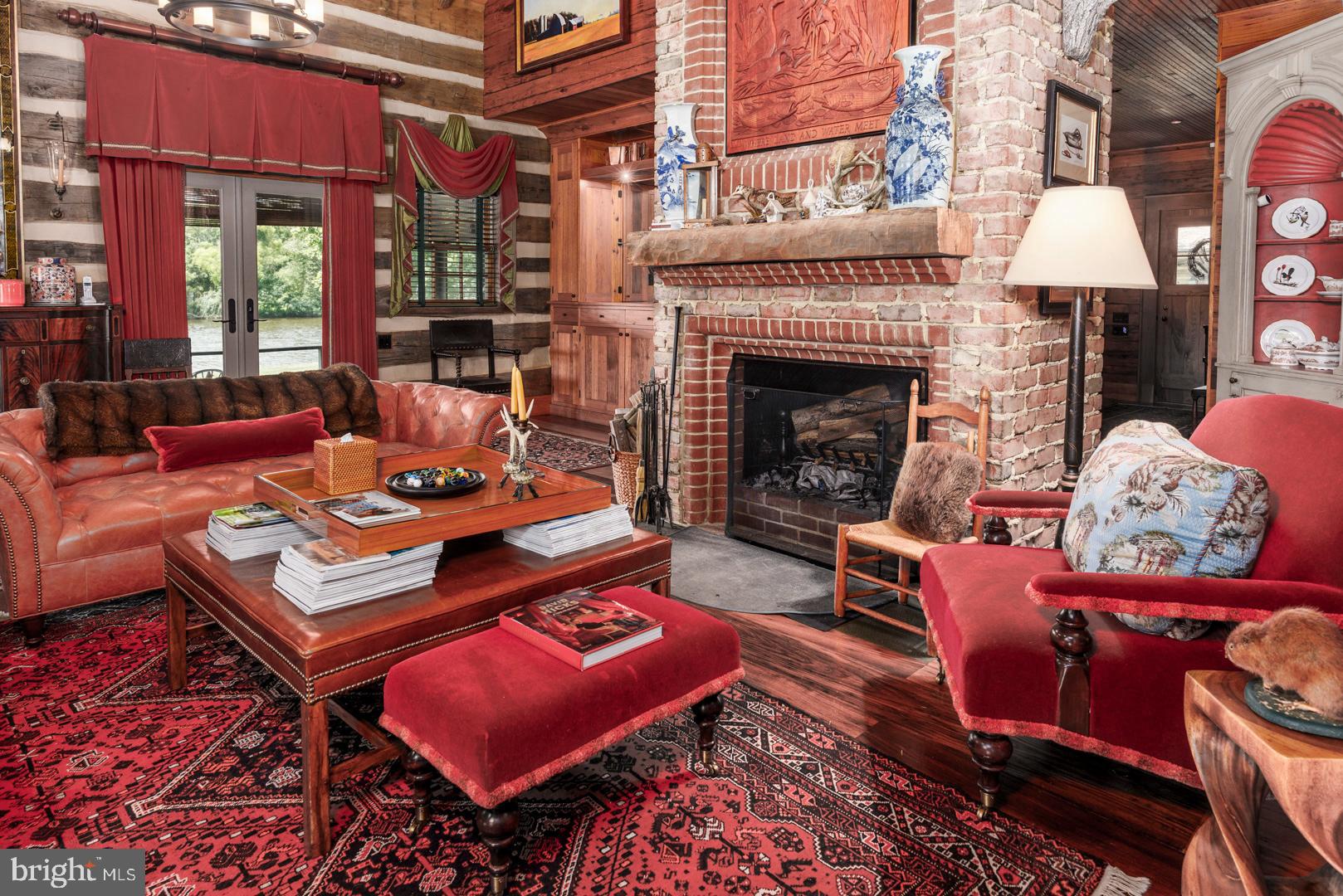 6150 Oxford Road Easton, MD 21601 - Photo 19 of 52 a outdoor living space with furniture and a fireplace