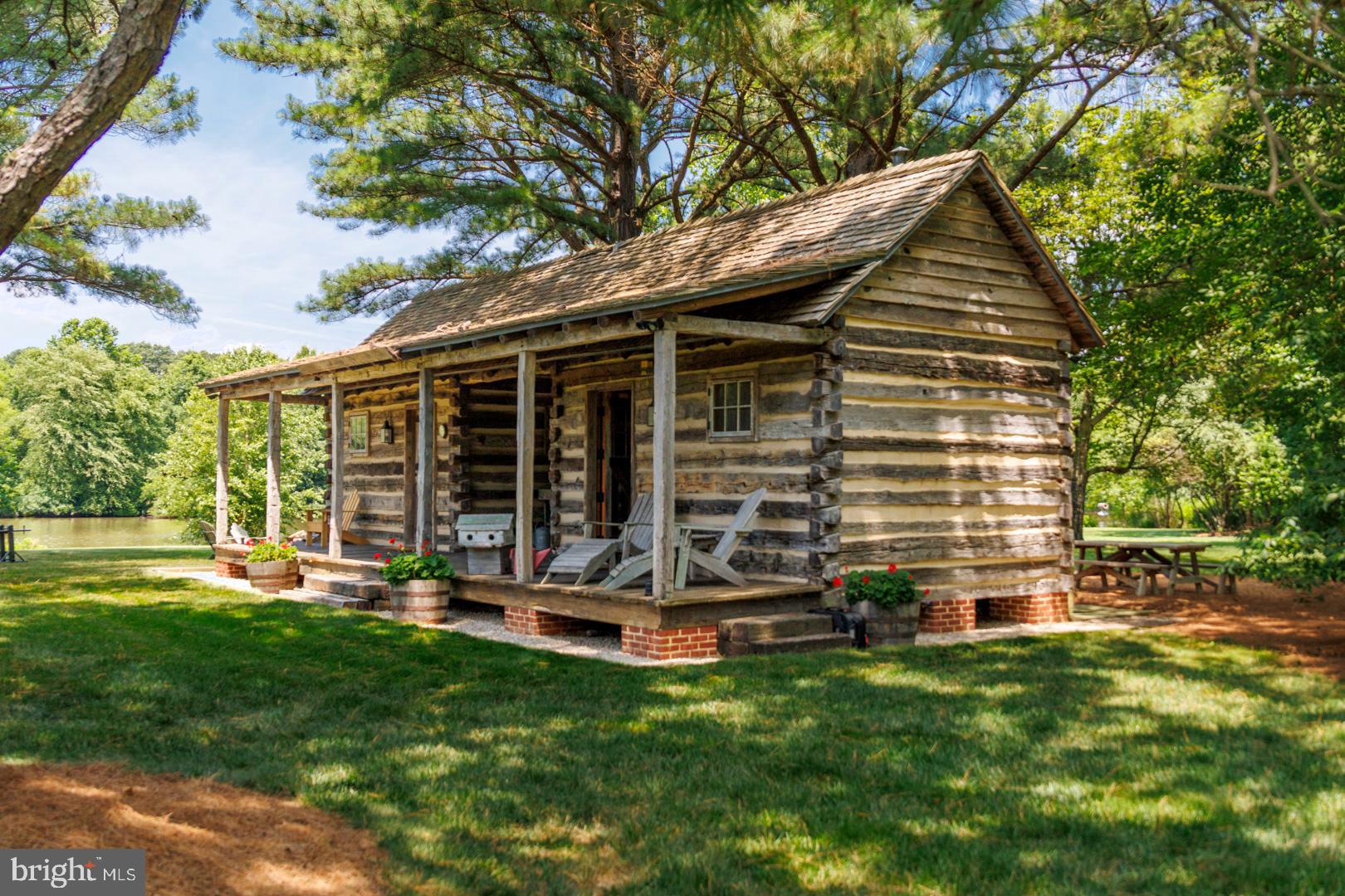 6150 Oxford Road Easton, MD 21601 - Photo 36 of 52 a view of a house with backyard porch and sitting area