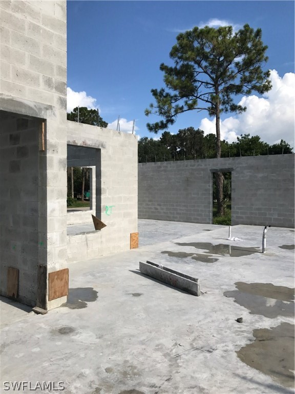 18410 Hepatica Road Fort Myers, FL 33967 - Photo 5 of 11 a swimming pool with trees in front of it