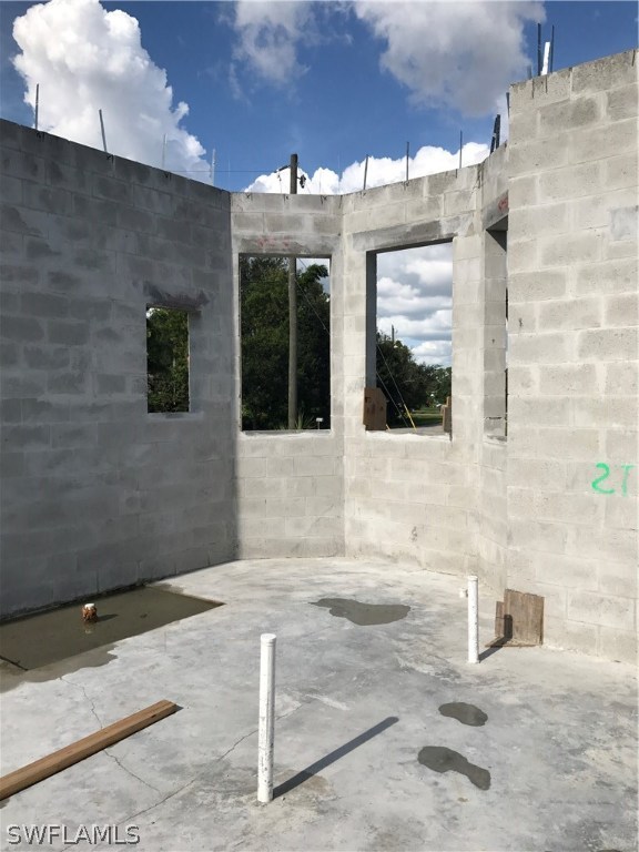 18410 Hepatica Road Fort Myers, FL 33967 - Photo 7 of 11 a front view of a building with shower