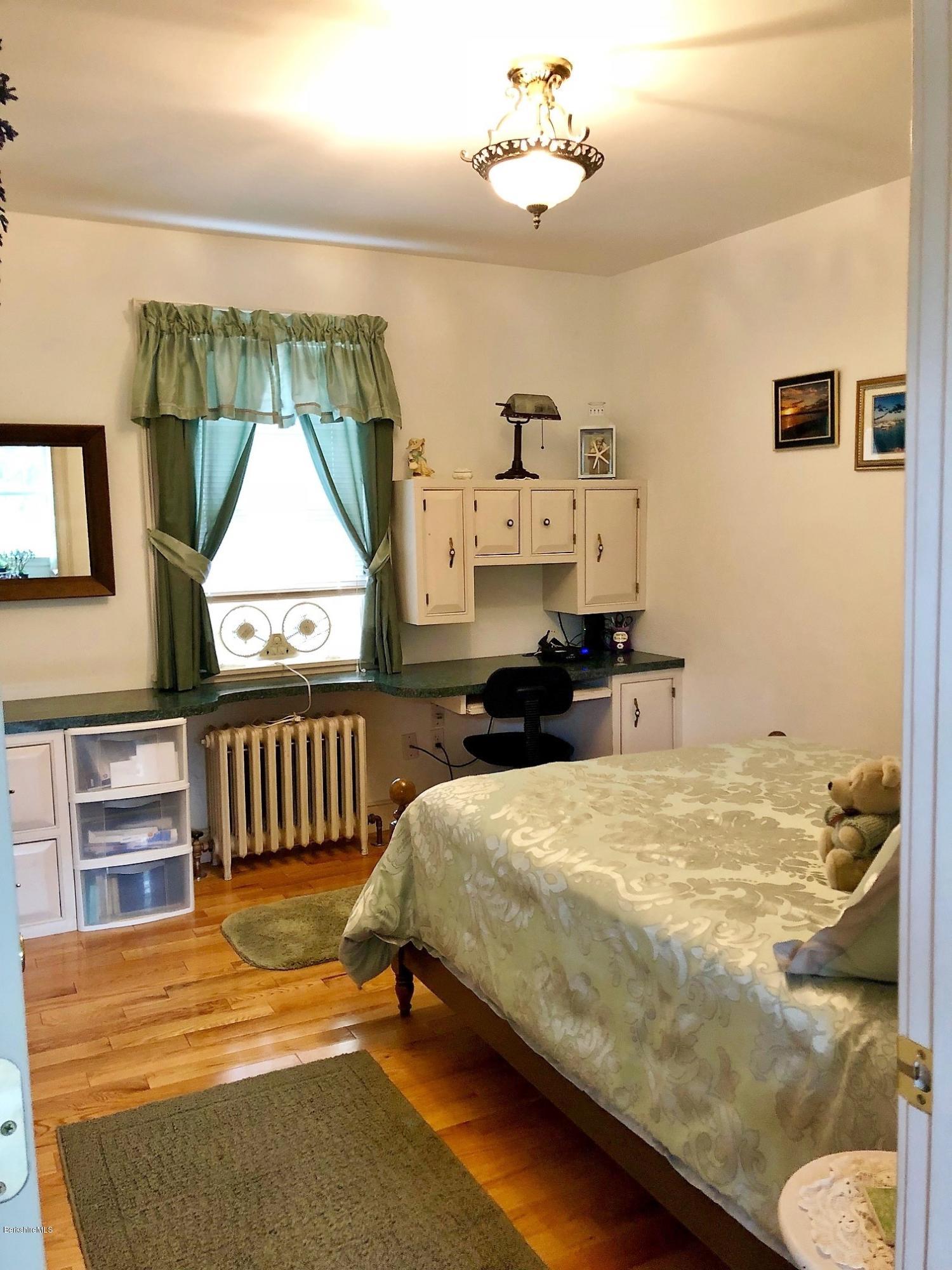 16 Anthony Road Richmond, MA 01201 - Photo 14 of 28 a bedroom with a bed and window