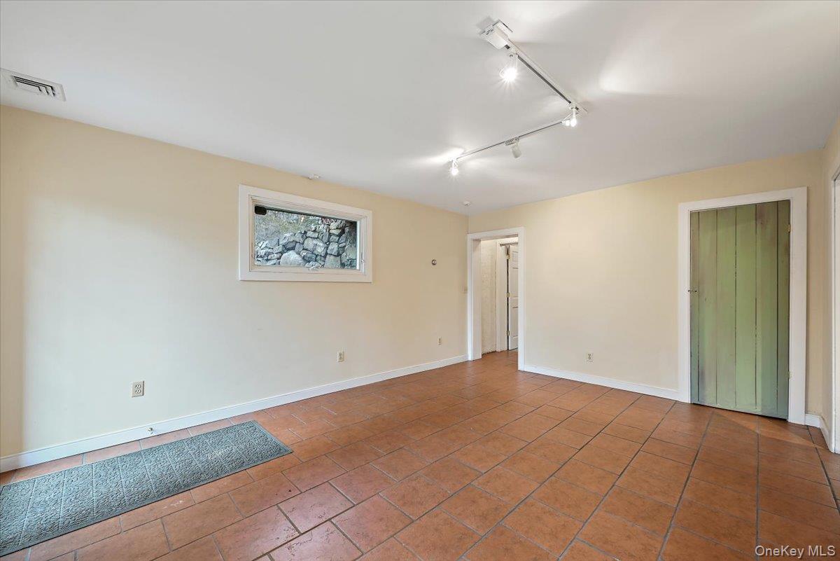 948 Craigville Road Chester, NY 10918 - Photo 18 of 42 a view of an empty room with a window
