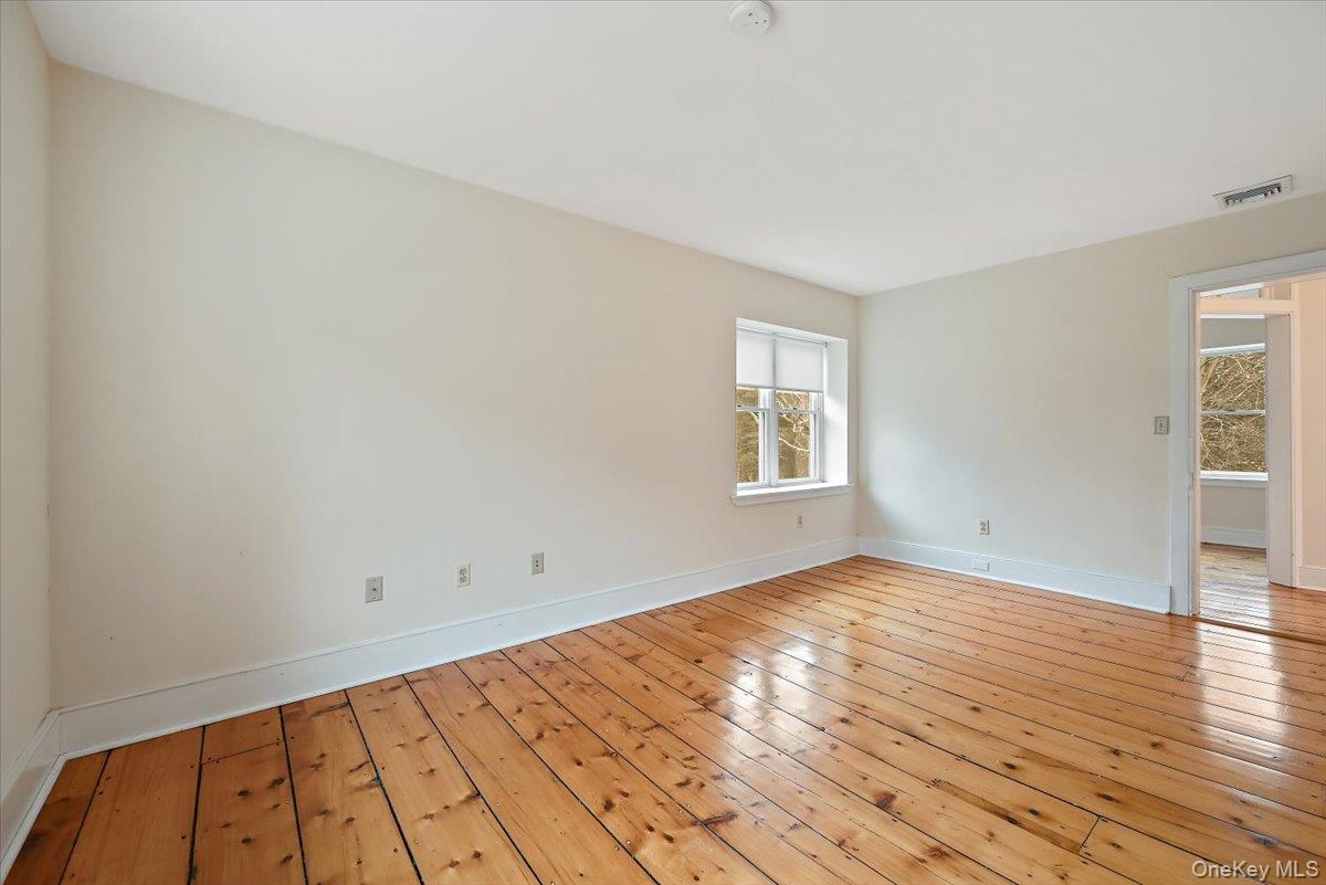 948 Craigville Road Chester, NY 10918 - Photo 24 of 42 wooden floor in an empty room