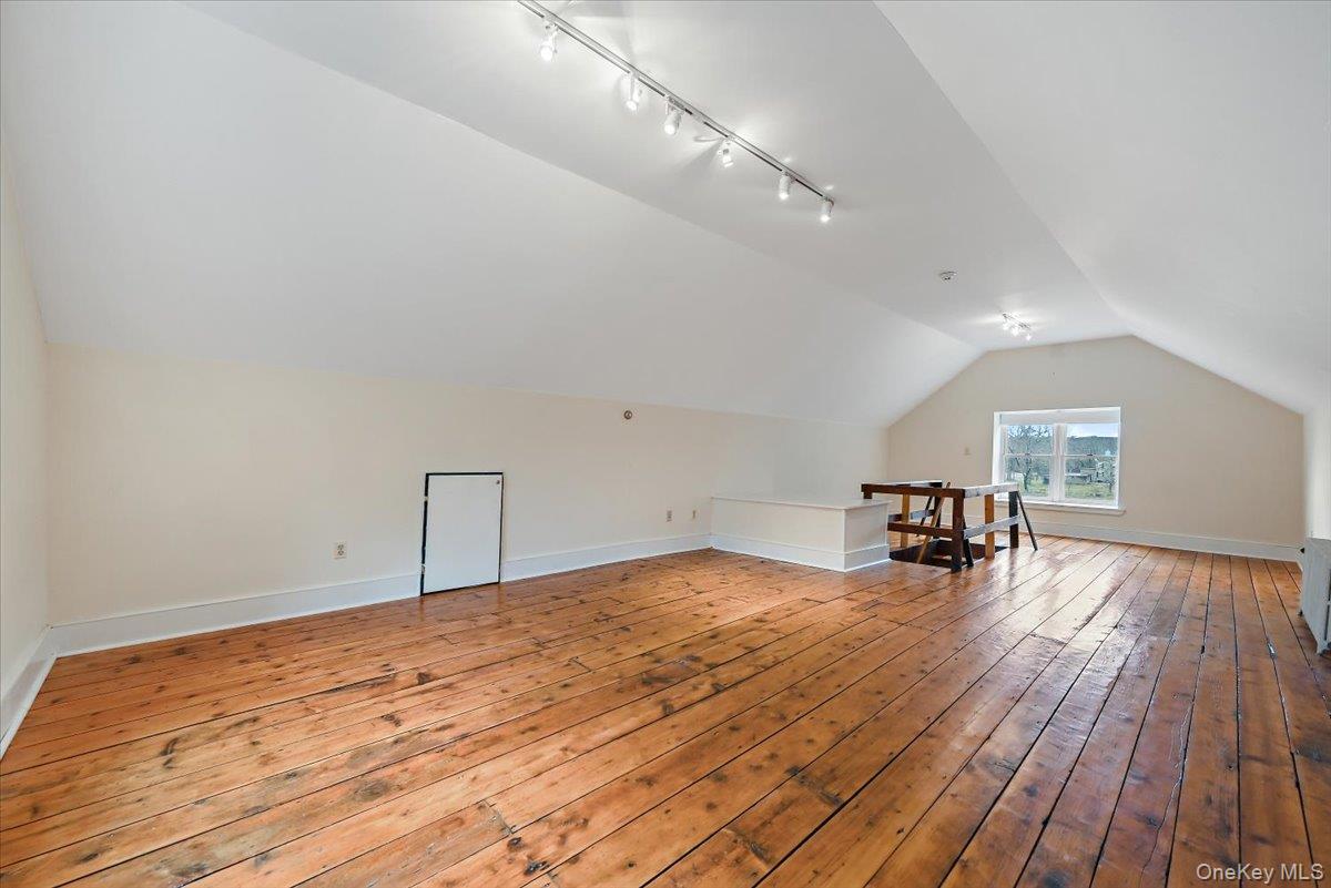 948 Craigville Road Chester, NY 10918 - Photo 32 of 42 a view of empty room with wooden floor