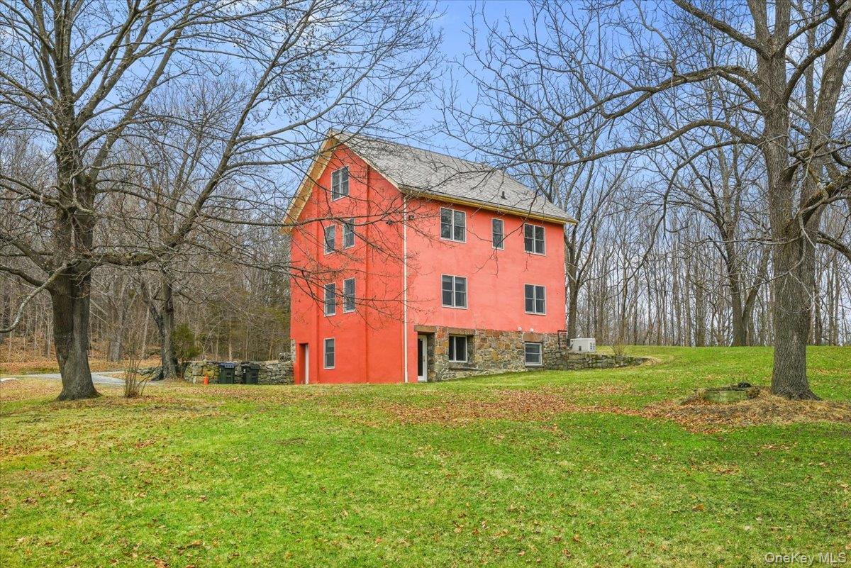 948 Craigville Road Chester, NY 10918 - Photo 33 of 42 a front view of house with a yard and trees