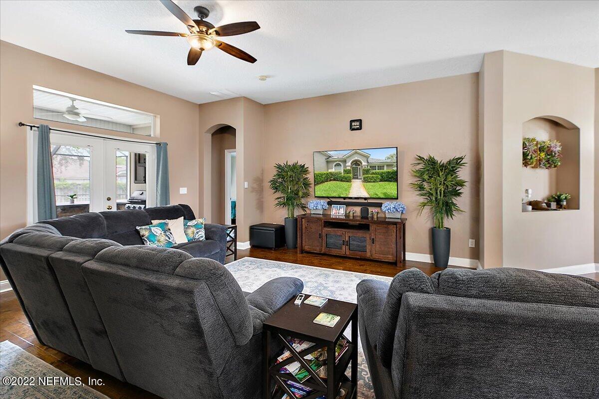 86003 Maple Leaf Place Yulee, FL 32097 - Photo 9 of 27 a living room with furniture and wooden floor