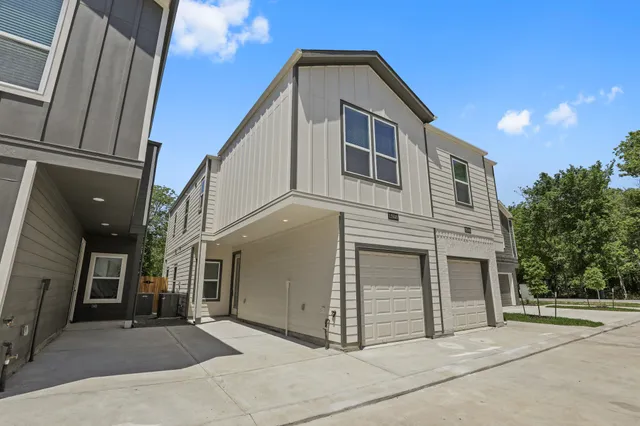 a view of a house with a garage