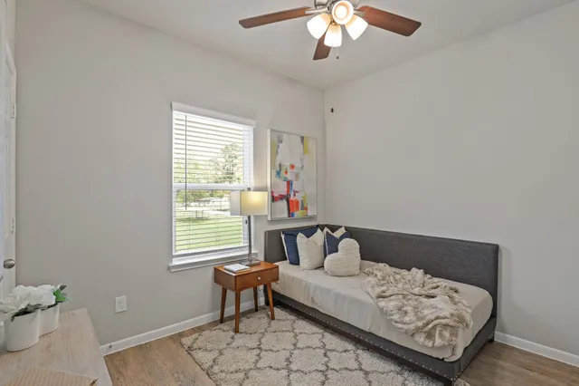 a living room with furniture and a window