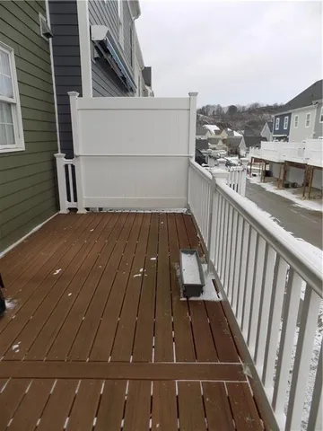 a view of a balcony with chairs
