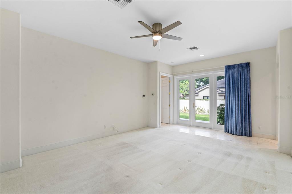 9701 Lake Isleworth Court Windermere, FL 34786 - Photo 11 of 31 a view of an empty room with a window