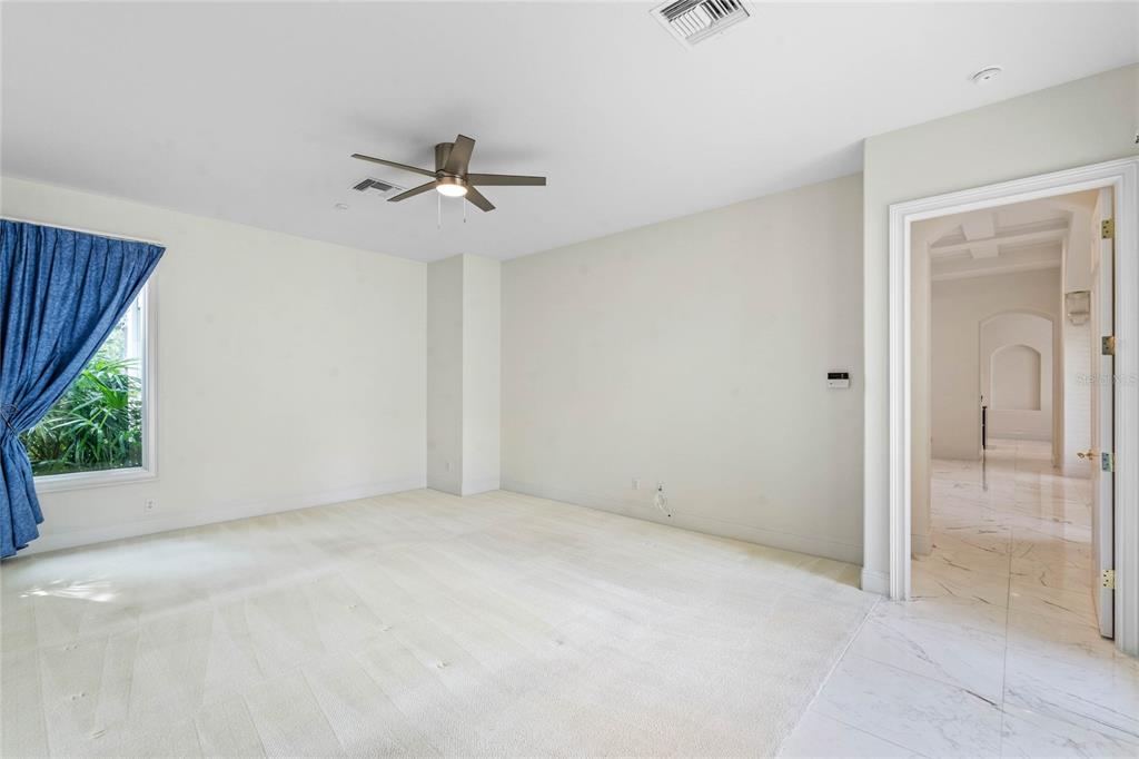 9701 Lake Isleworth Court Windermere, FL 34786 - Photo 12 of 31 an empty room with windows