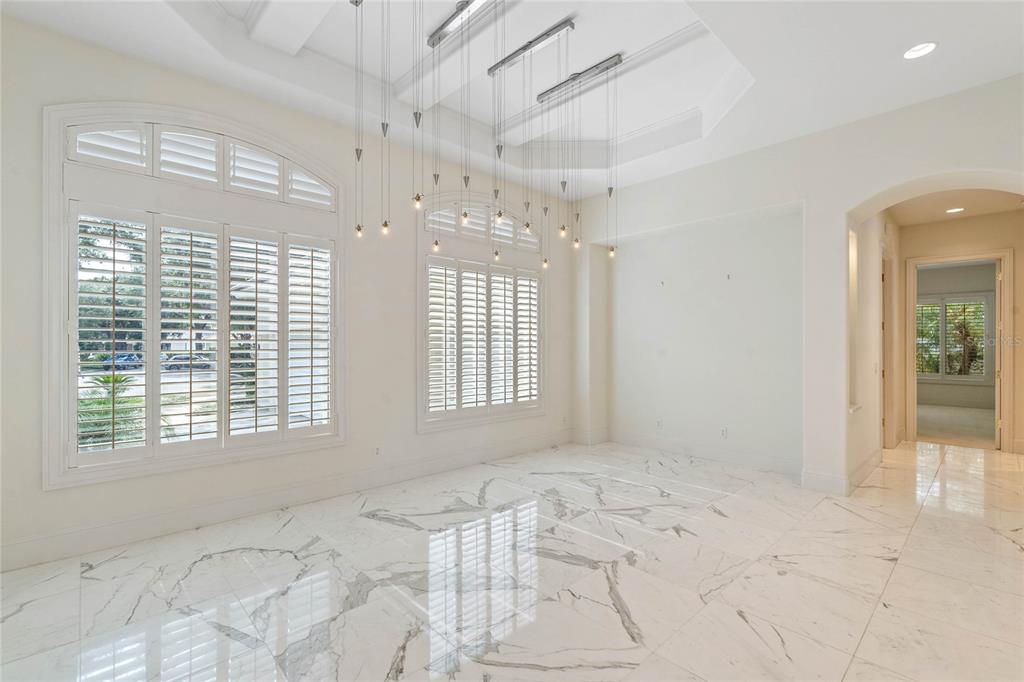 9701 Lake Isleworth Court Windermere, FL 34786 - Photo 14 of 31 a view of an empty room with a window