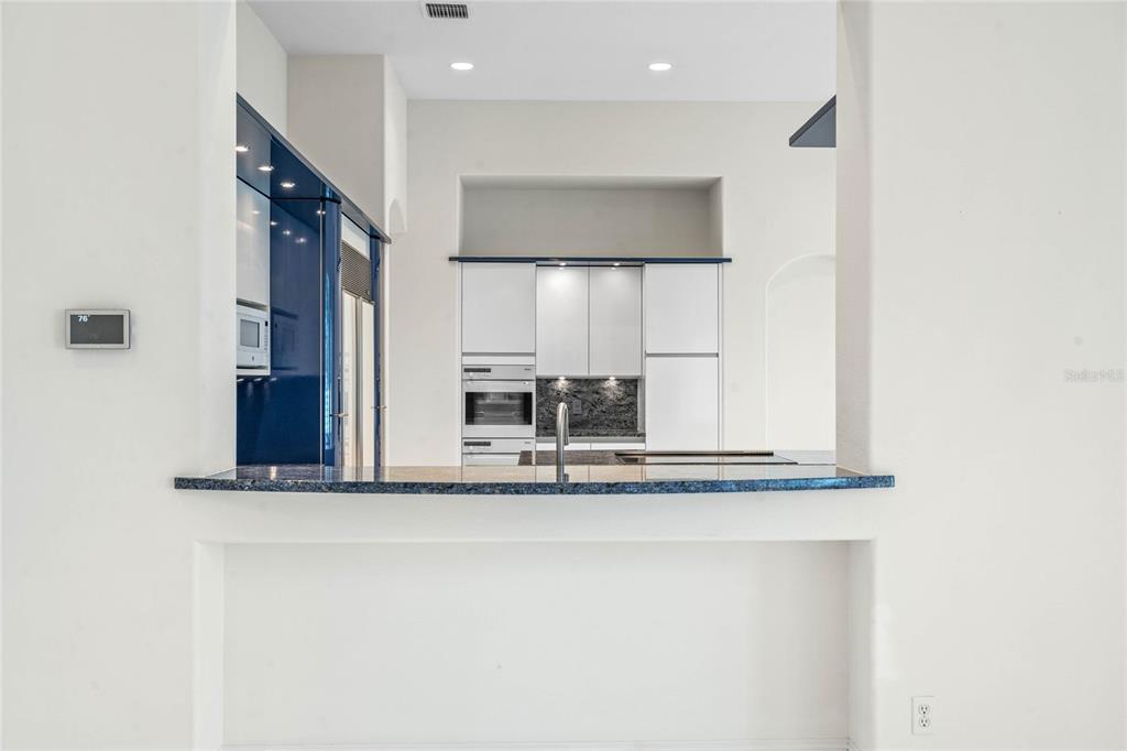 9701 Lake Isleworth Court Windermere, FL 34786 - Photo 20 of 31 a view of a hallway with windows