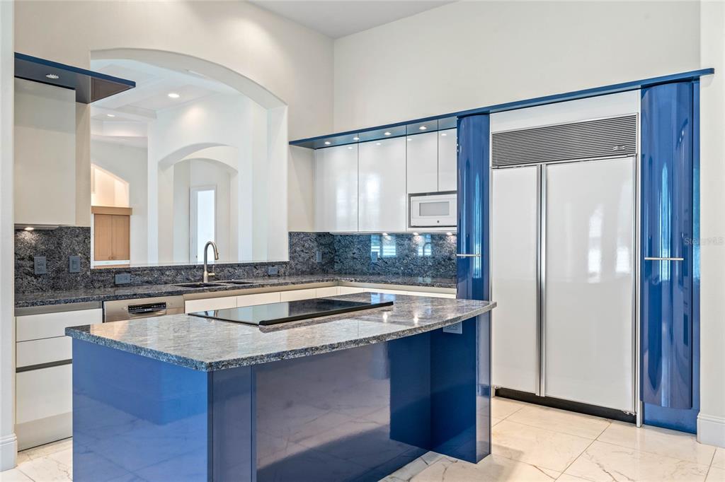 9701 Lake Isleworth Court Windermere, FL 34786 - Photo 24 of 31 a kitchen with a stove and a sink