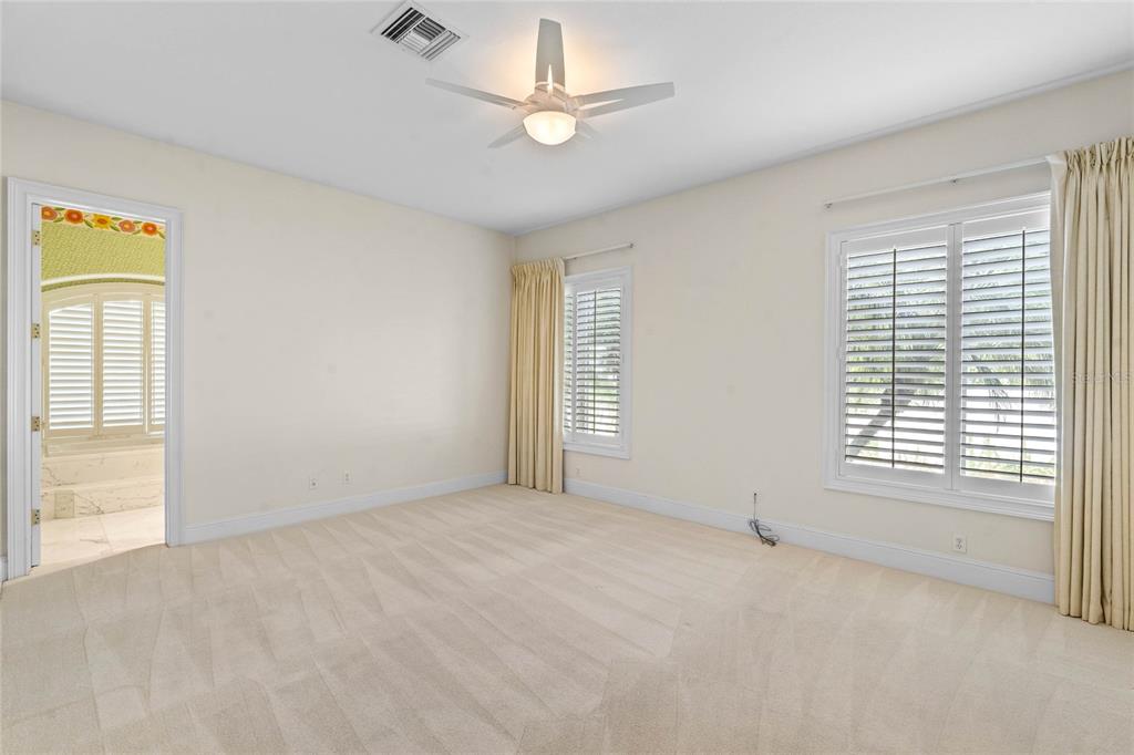 9701 Lake Isleworth Court Windermere, FL 34786 - Photo 5 of 31 a view of an empty room with a window