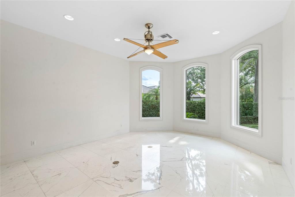 9701 Lake Isleworth Court Windermere, FL 34786 - Photo 7 of 31 a view of an empty room with a window