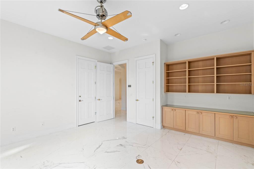 9701 Lake Isleworth Court Windermere, FL 34786 - Photo 8 of 31 a view of an empty room with a window