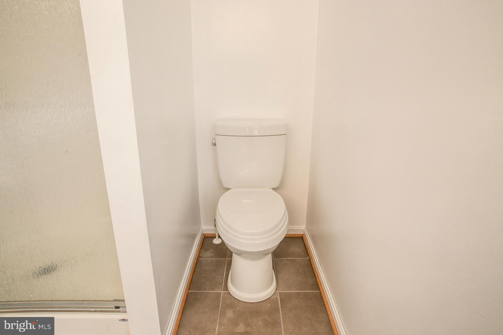 1995 Sixes Road Prince Frederick, MD 20678 - Photo 13 of 30 a close view of a toilet in a bathroom