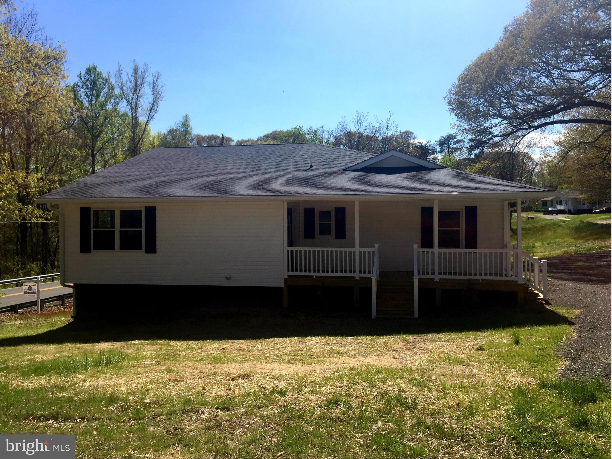 1995 Sixes Road Prince Frederick, MD 20678 - Photo 29 of 30 a front view of a house with a yard