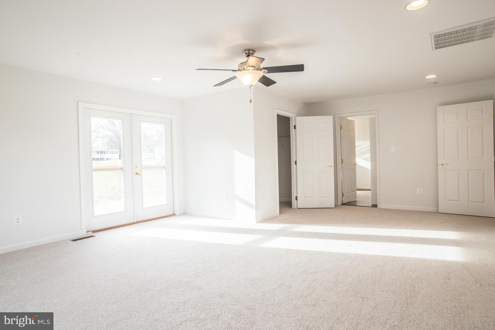 1995 Sixes Road Prince Frederick, MD 20678 - Photo 7 of 30 a view of a livingroom with a ceiling fan and window