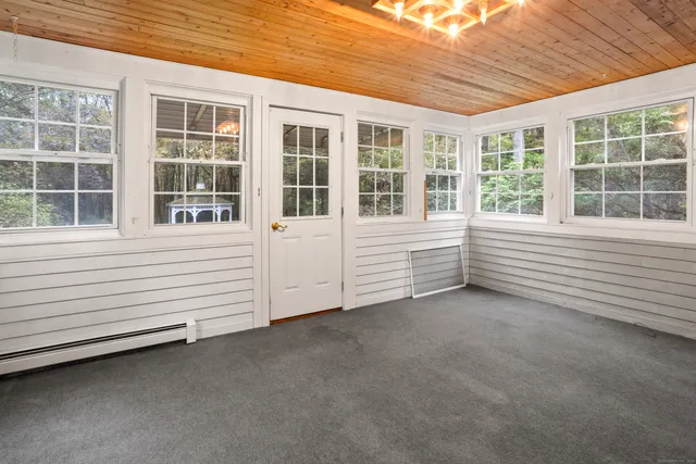 a view of a house with a large window