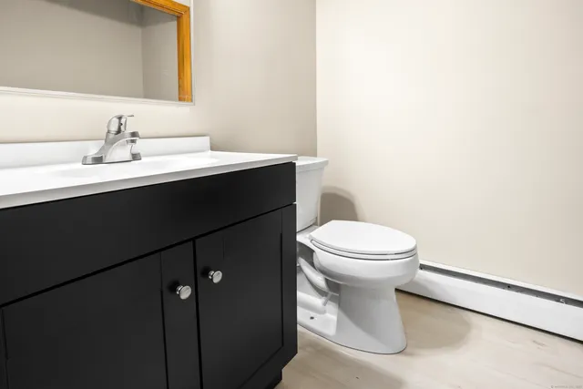 a bathroom with a sink and a toilet