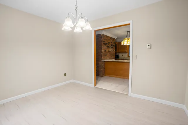 an empty room with a bathroom