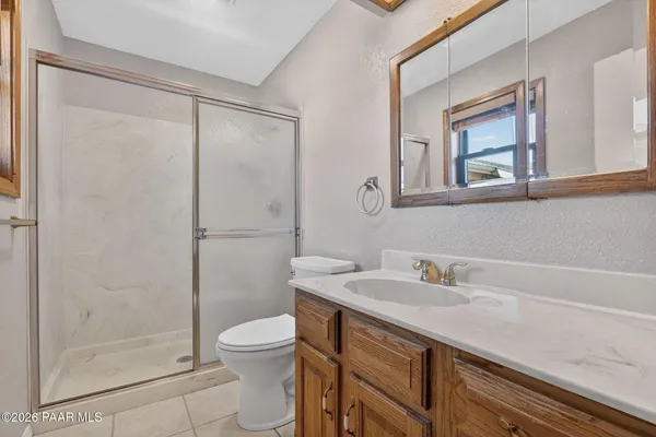 a view of an chairs and tables in a room