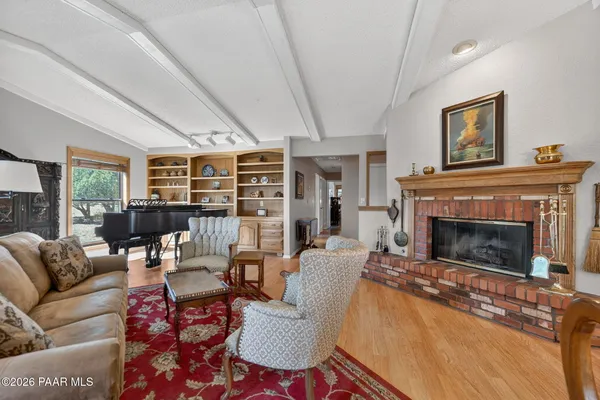 a utility room with cabinets washer and dryer