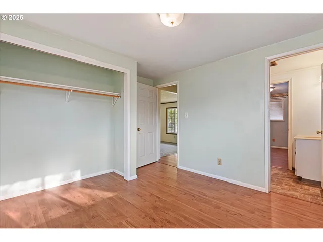 a bathroom with a tub and shower