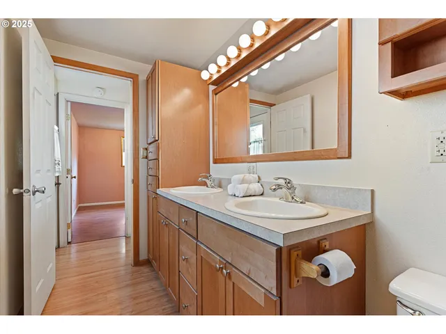 a view of a livingroom with furniture and chandelier